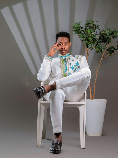 Elegant Ethiopian Men’s Outfit with Blue and Green Cross Motifs for Celebrations Includes Shirt and Pants