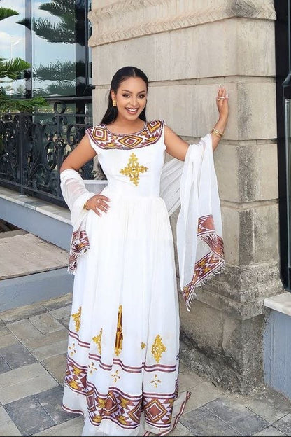  Beautiful Habesha Dress with Intricate Gold and Brown Tibeb For Cultural Event
