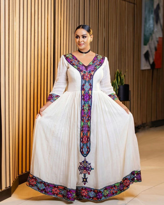 Colorful Habesha Dress with Multicolor Cross Embroidery for Special Occasions
