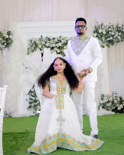 Regal Habesha Couple Outfit with Gold and Aqua Blue Wedding Dress and Matching Men’s Set for Traditional Ceremonies

