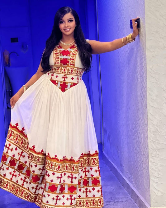 Beautiful Sleeveless Habesha Dress with Intricate Red and Gold Design Ethiopian Dress For Weddings.

