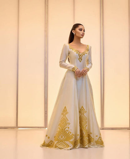 Elegant Ivory Habesha Wedding Dress with Intricate Gold Embroidery For Wedding