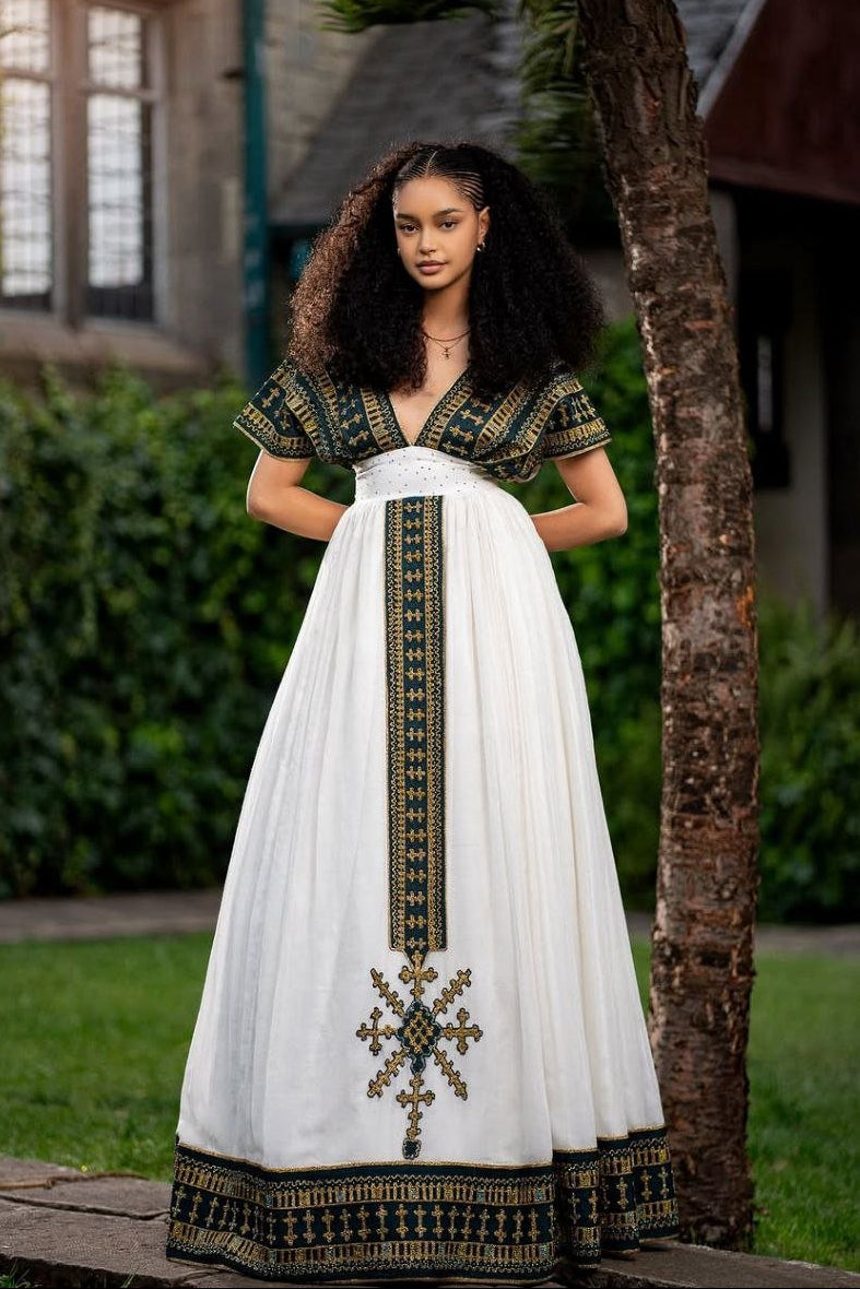 Elegant Traditional Ethiopian Dress with Rich Green and Gold Embroidery for Cultural Celebrations
