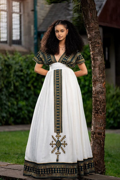 Elegant Traditional Ethiopian Dress with Rich Green and Gold Embroidery for Cultural Celebrations

