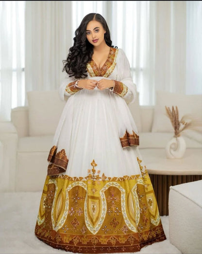 Stunning Habesha Dress with Luxurious Gold Embroidery for Weddings
