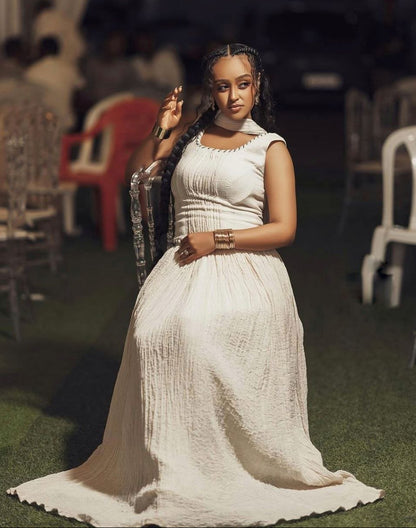 Simple Habesha Dress with Textured Fabric for Special Events

