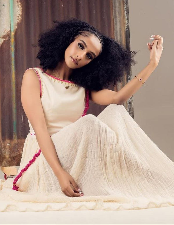 Classic Habesha Dress with Elegant Embroidery for a Subtle Cultural Statement
