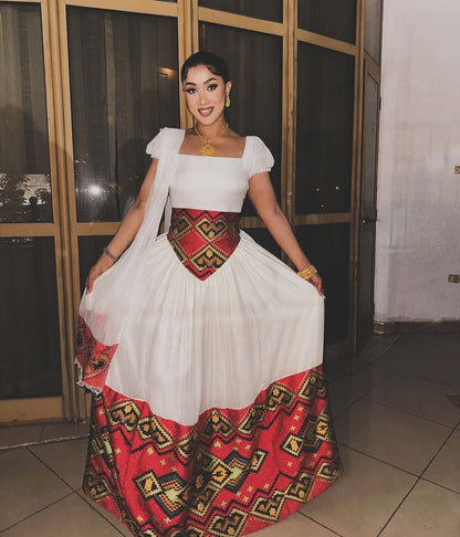 Elegant Habesha Dress with Intricate Waist Embroidery for Striking Cultural Elegance
