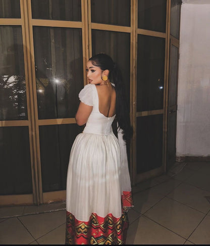 Elegant Habesha Dress with Intricate Waist Embroidery for Striking Cultural Elegance