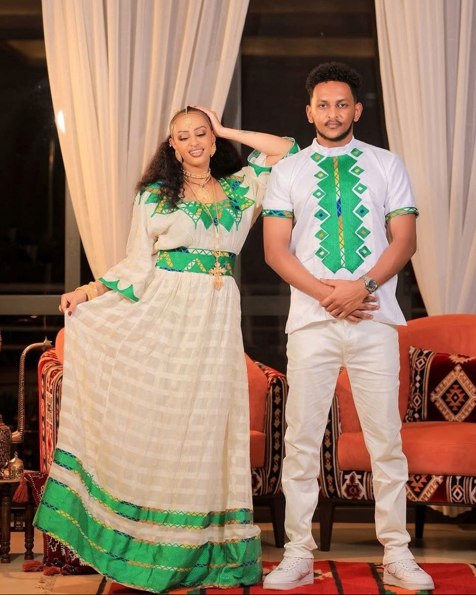 Beautiful Habesha Couple’s Outfit with Elegant Green Embroidery a Perfect Choice for Celebrations
