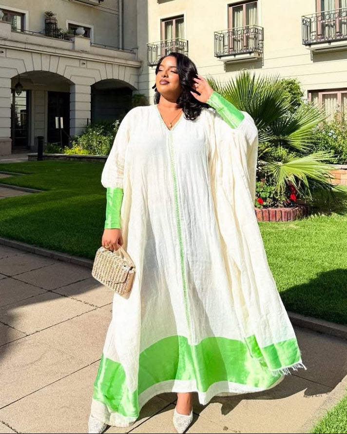 Graceful Habesha Kemis with Elegant Green Embroidery for Celebrations
