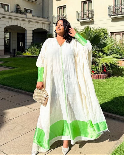 Graceful Habesha Kemis with Elegant Green Embroidery for Celebrations
