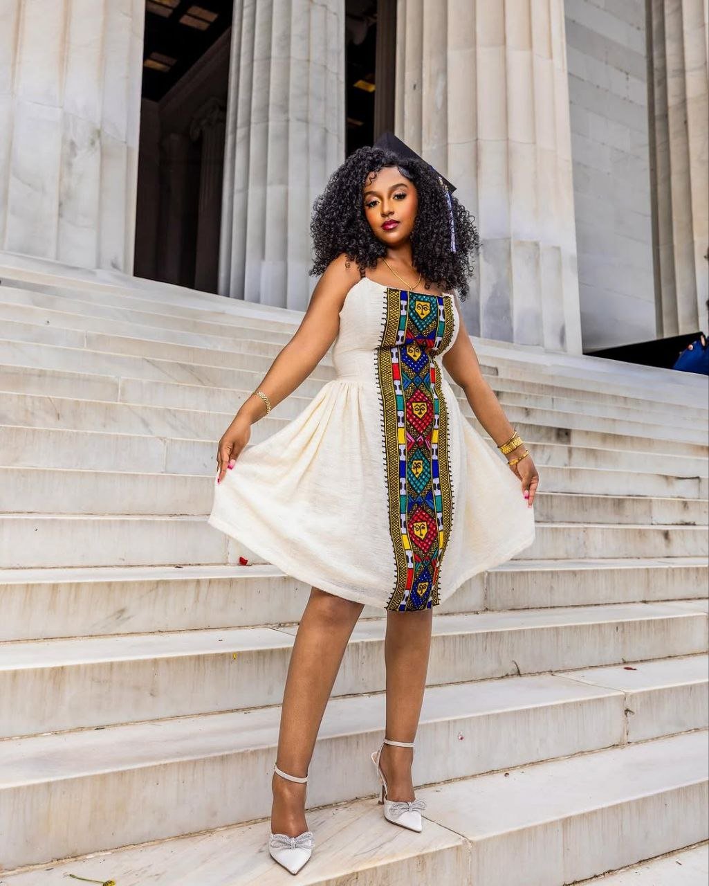 Chic Habesha Kemis with Vibrant Multicolored Embroidery for Celebrations: A Modern Habesha Dress
