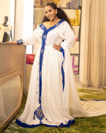 Beautiful Habesha Kemis with Royal Blue Embroidery Traditional Ethiopian Dress for Special Occasions
