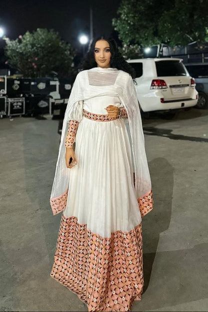 Chic Habesha Kemis with Pink Accents and Flowing Design for Celebration - Habesha Clothing - Eritrean Dress
