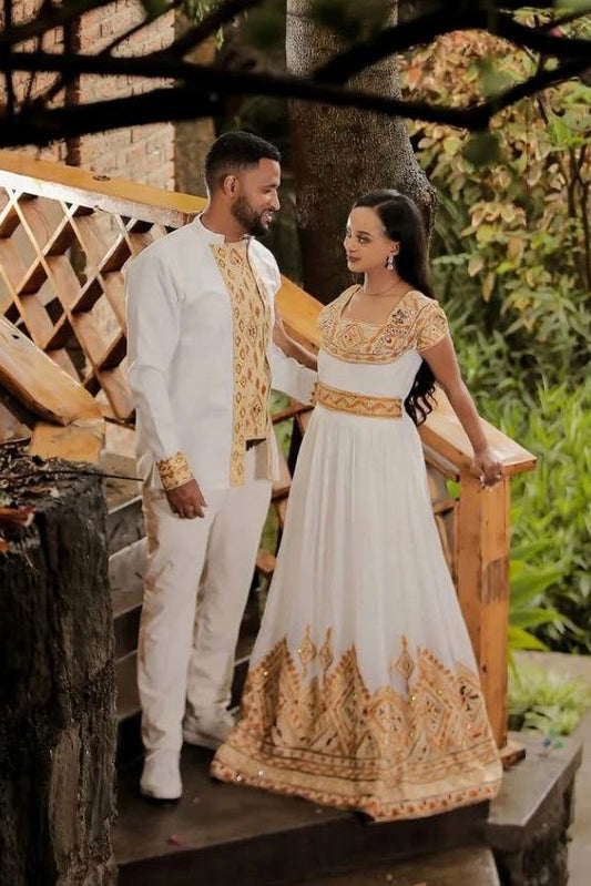 Elegant Ethiopian Couple in Traditional Gold Wedding Attire – Habesha Kemis – Ethiopian Wedding Dress – Eritrean Clothing
