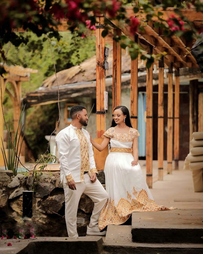 Elegant Ethiopian Couple in Traditional Gold Wedding Attire – Habesha Kemis – Ethiopian Wedding Dress – Eritrean Clothing