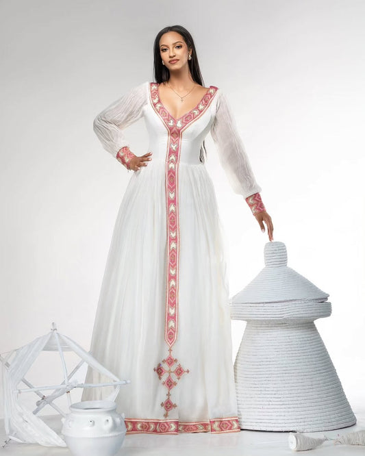 Elegant Ethiopian Habesha Kemis with Pink & Gold Tibeb Detailing