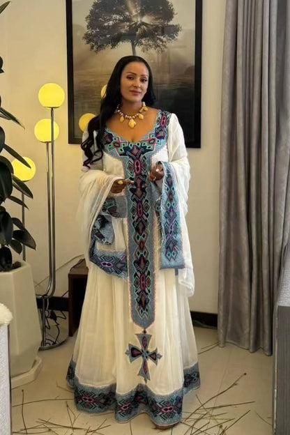 Elegant Habesha Kemis with Blue, Magenta & Turquoise Tibeb Embroidery

