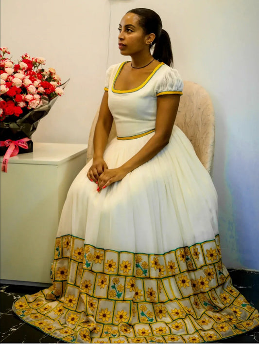 Habesha Kemis with Yellow Flower Embroidery – Modern Ethiopian Traditional Dress