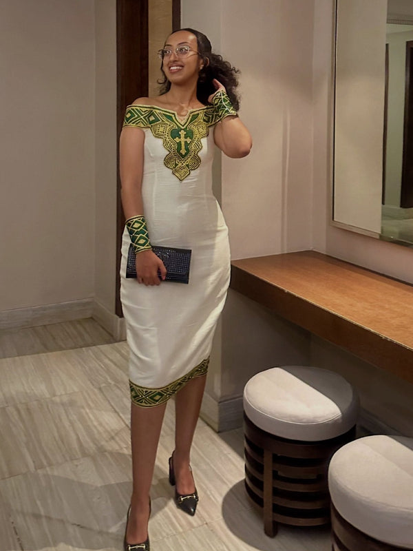 Refined White Ethiopian Heritage Outfit with Green Tibeb