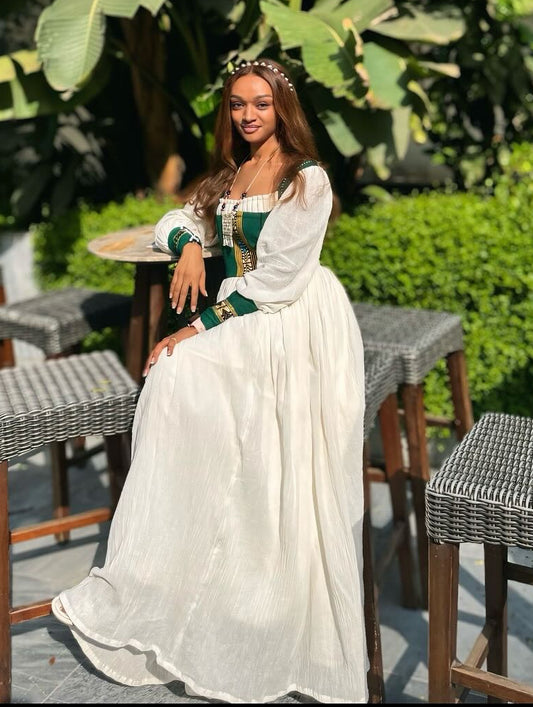 ethiopian dress for women Elegant White Habesha Traditional Dress with Purple Tilf Embroidery Comfortable yet elegant Ethiopian woman's attire | The