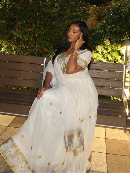 Exquisite Habesha Kemis Online Traditional Ethiopian & Eritrean Dress with Handwoven Gold Accents 1020
