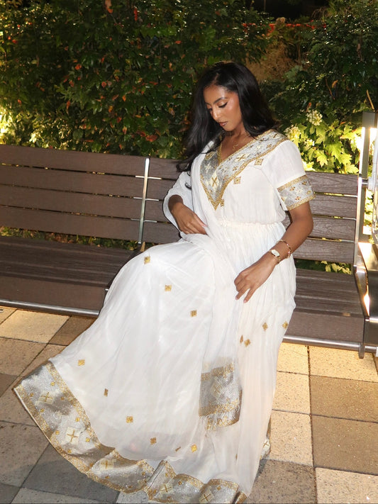 Elegant Handwoven Habesha Kemis with Radiant Golden Tibeb Heritage Detailing