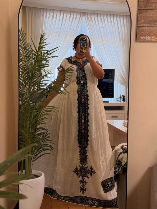 Elegant White Ethiopian Heritage Dress with Black Tribal Embroidery