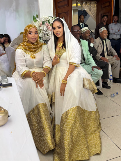 Golden Geometric Habesha Dress Design Ensemble with Graceful Ethiopian Dress Detailing 1072