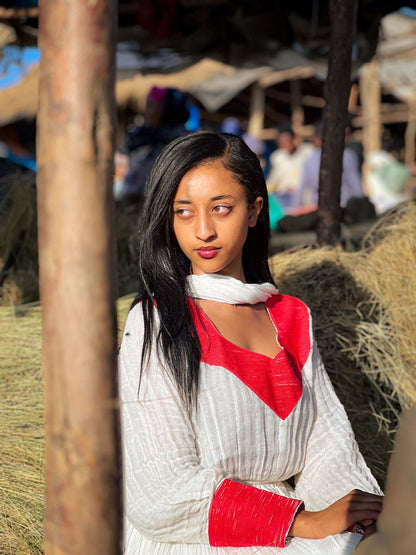 Elegant Ivory and Crimson Habesha Kemis Flowing Pleats, Bold Traditional Accents, and Timeless Ethiopian Dress 1089