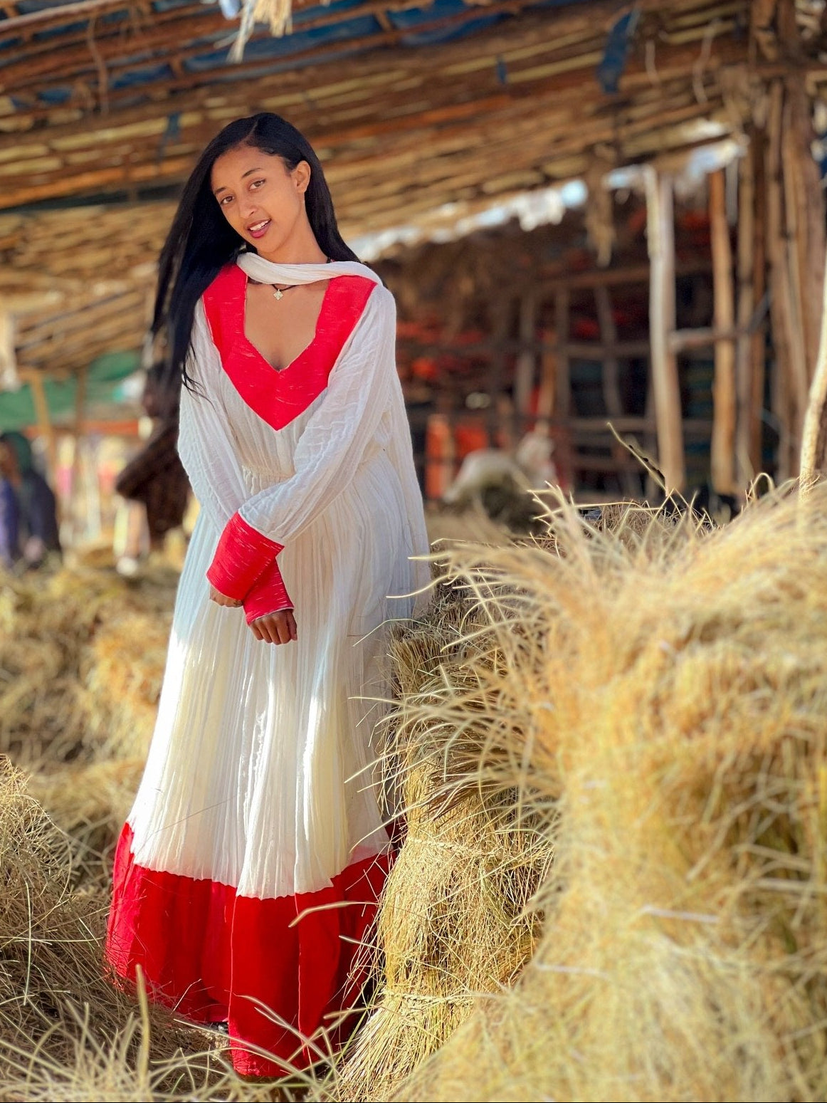 Elegant Ivory and Crimson Habesha Kemis Flowing Pleats, Bold Traditional Accents, and Timeless Ethiopian Dress 1089