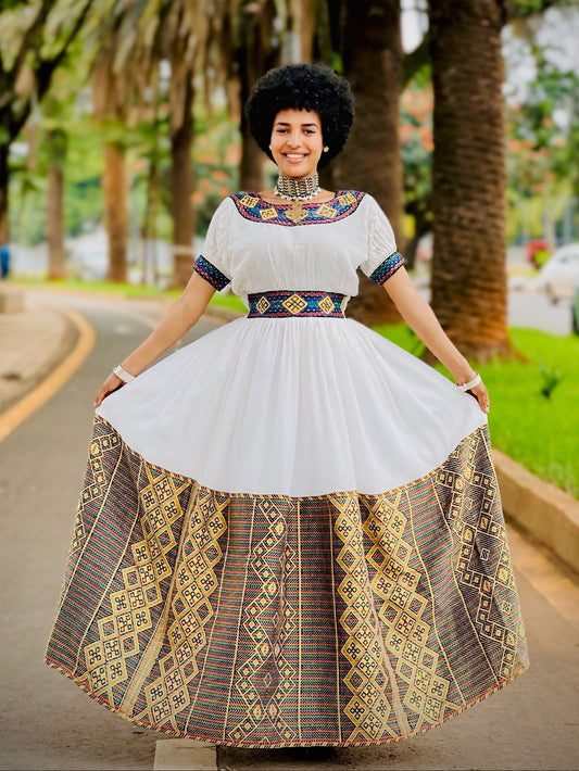 Regal Ethiopian Habesha Ensemble with Vibrant Geometric Woven Details