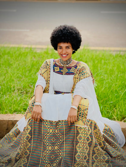 Regal Ethiopian Dress Ensemble Vibrant Geometric Weaving Habesha Kemis and Timeless Cultural Elegance 1124