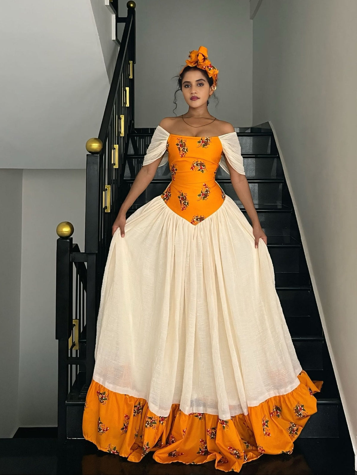 Vibrant Orange Floral Off-Shoulder Gown Fine habesha cloth