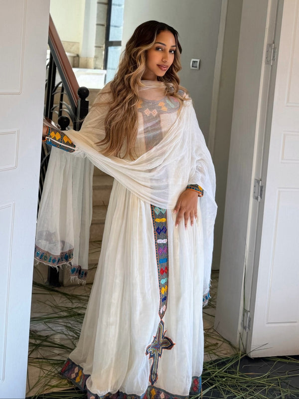Vibrant Geometric Embroidered Cultural Gown Pure habesha cloth