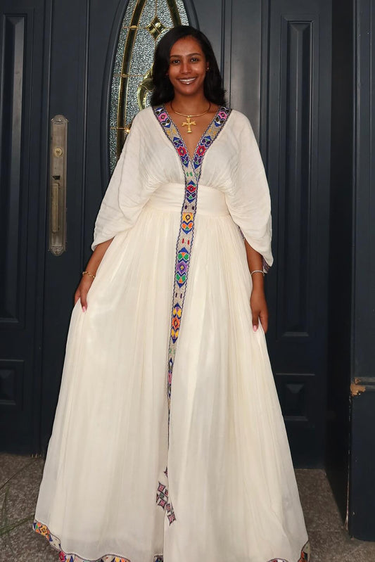 White Habesha Kemis with Colorful Tilet – Ethiopian & Eritrean Dress