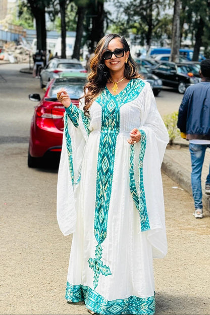 Vibrant Long Sleeve Habesha Dress with Colorful Woven Details 