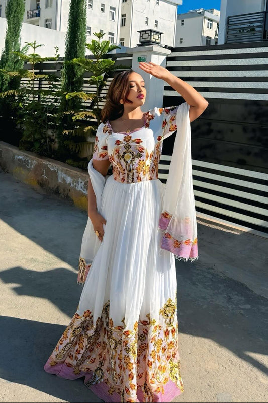 Traditional Ethiopian Kemis with Pink Accent and Gold Detail